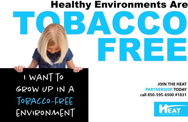 Healthy environments are tobacco free. Girl holding sign that says, I want to grow up in a tobacco-free environment. Join the heat partnership today. call 850-595-6500 extension 1830