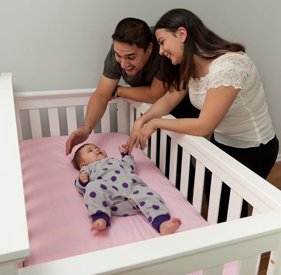 Parents place baby in a safe sleep environment. 
