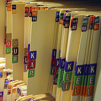 A shelf full of medical files.