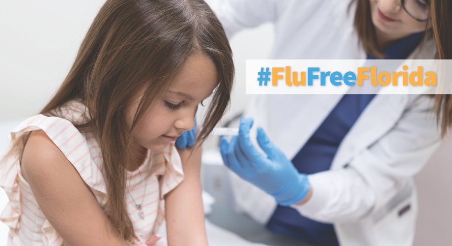 Image show a young girl being given a flu shot by a female doctor. There is text over the image that says, "#FluFreeFlorida".