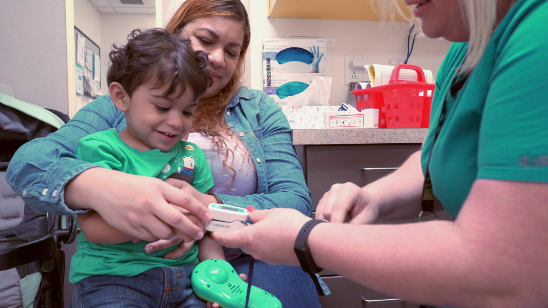 Child getting pulse rate checked
