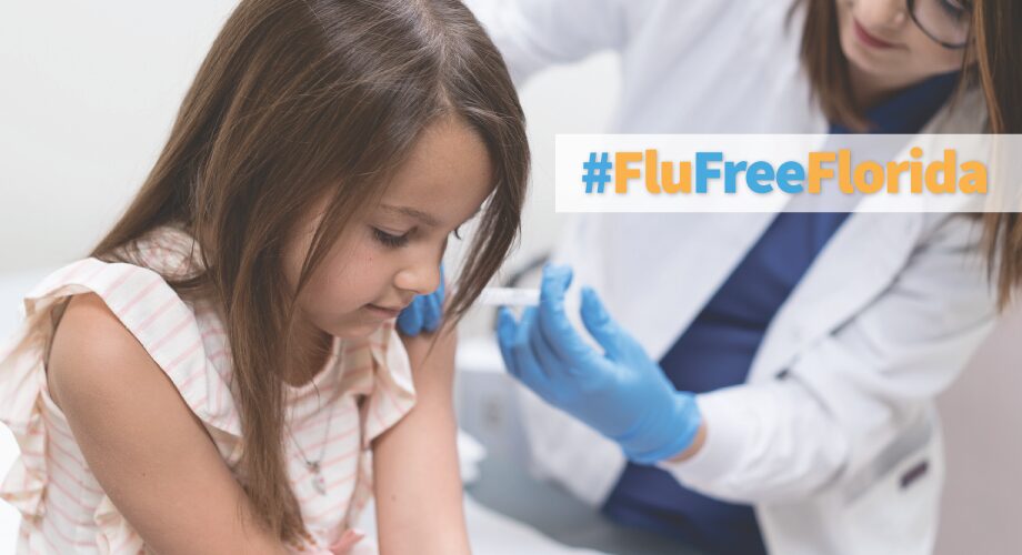 Young girl receiving flu vaccine